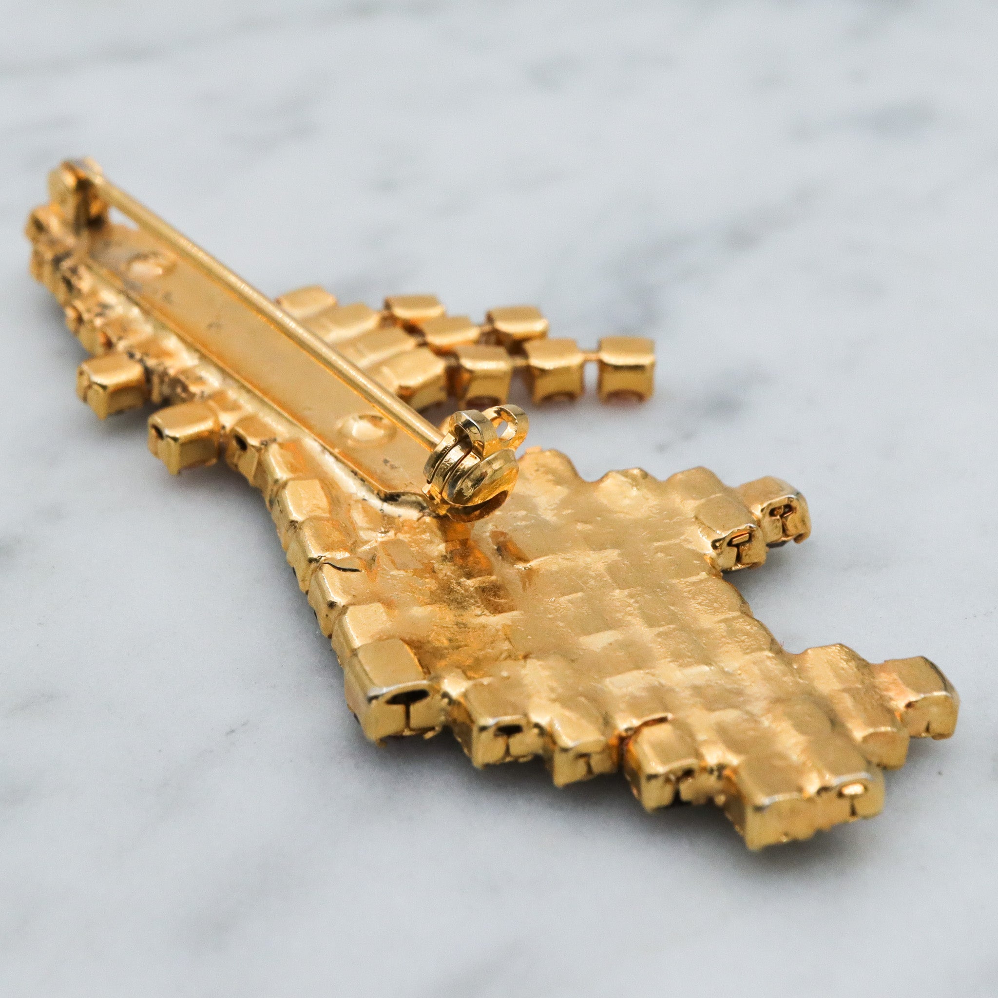 Vintage gold tone rhinestone witch brooch